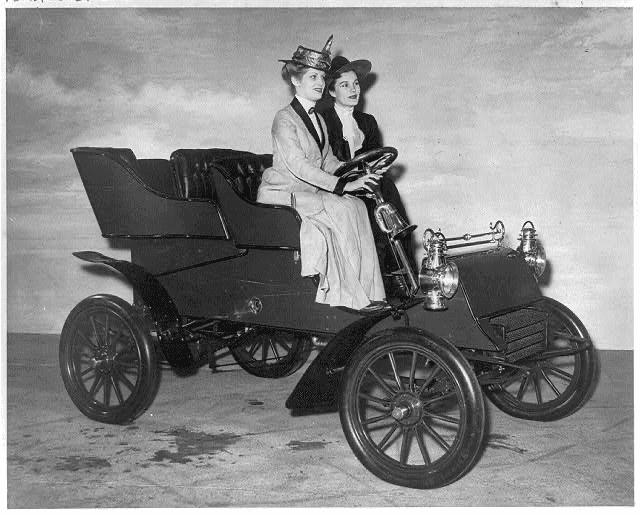 A 1903 photograph of two women driving an early Ford motor car